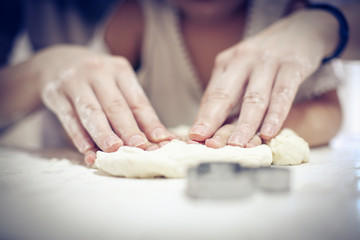 Making cookies in the kitchen.