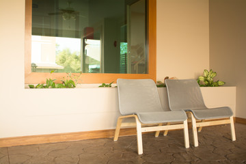 Neutral interior mockup with two wicker chairs