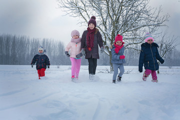 Group of children at winter season.
