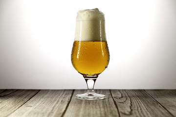  glass of beer with foam