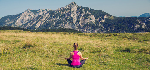 Woman Meditate at the Mountains