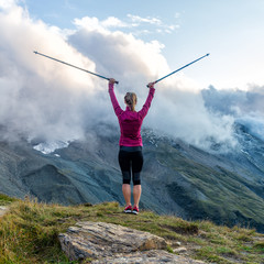 Young woman on the top of mountains