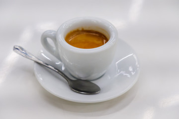 Cup of coffee over white background
