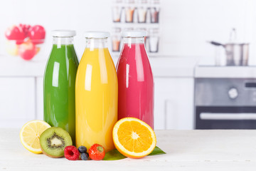 Juice smoothie orange smoothies in kitchen copyspace bottle fruit fruits