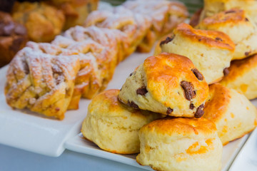 Breakfast Danish pastry and scone - Danish pastry and chocolate chip scone for catering at Spring Festival picnic event