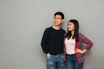 Naklejka premium Cheerful young asian loving couple