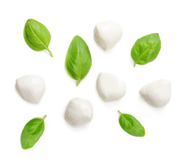 Obraz premium Mozzarella cheese and basil leaf isolated on white background. Top view.