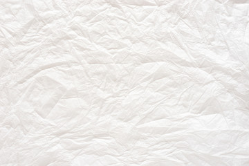 white crumpled paper texture background.