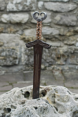Ancient sword stuck in stone