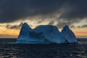 Fototapeta na wymiar Iceberg at Dusk