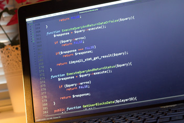 PHP back-end code. Computer programming source code. Abstract screen of web developer. Digital technology modern background. Code is created by myself.