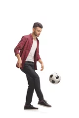 Foto op Canvas Young guy juggling a football © Ljupco Smokovski