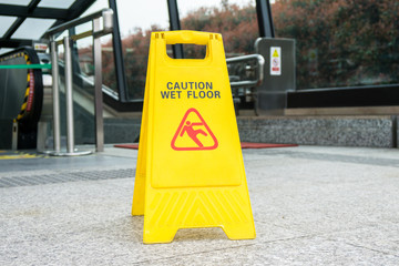 sign of caution wet floor