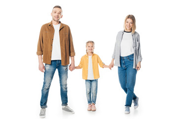 smiling family holding hands and looking at camera isolated on white