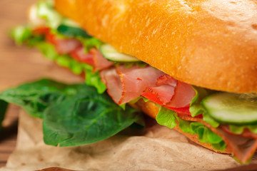 sandwich on a wooden table