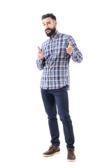 Confident cool friendly bearded guy pointing finger at camera and biting lips. Full body isolated on white background. 