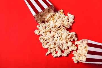 popcorn on color background