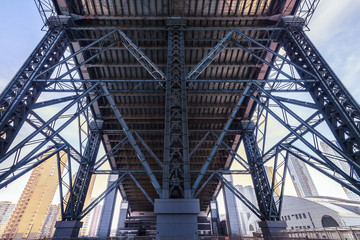 Under steel bridge structure skyway on the skyscraper background