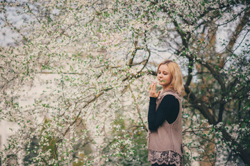 A pretty young girl walking in the park