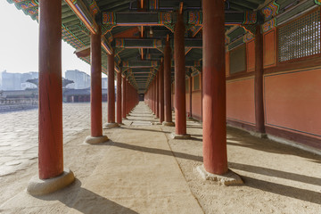  Traditional long Corridor and architecture of Gyeongbokgung Palace or The largest of the Five Grand Palaces in Seoul , South Korea