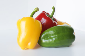 Fresh vegetables sweet Red, Yellow, Green Peppers isolated on white background