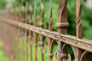 rusted iron fence