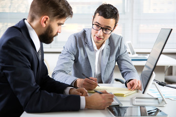 Businessmen working in an office