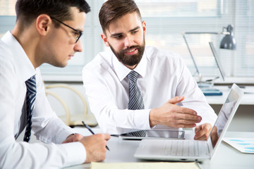 Fototapeta premium Businessmen working in an office