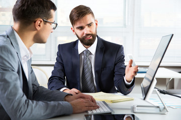 Fototapeta premium Businessmen working in an office