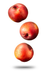 Falling nectarines peach isolated on white background. With clipping path.