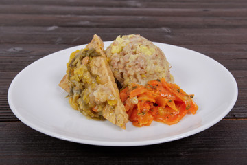 Tempeh with leek and mash on a table