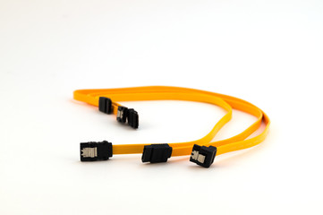 Three connecting cables for connecting electronic devices of yellow color with flat metal contacts.