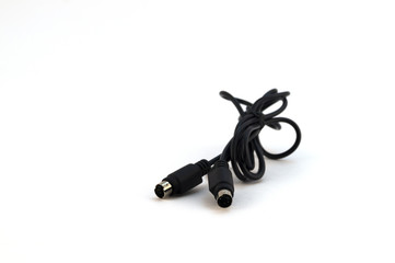 A thin black cable for connecting electronic devices with analog contacts.