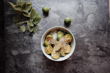 Healthy drink with fresh leaves, lemon, honey and sugar