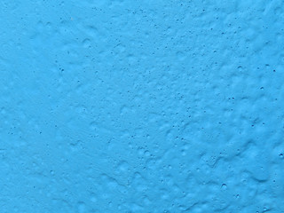 Fototapeta na wymiar Blue stucco wall texture background. Rough surface