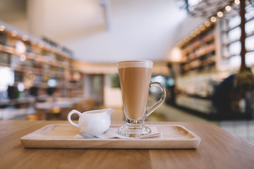 Thai milk tea on wooden table