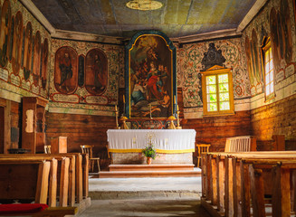 Fototapeta na wymiar Church interior of old Slovak Village - Zuberec is a village in northern Slovakia and a popular tourist center at the foothills of the Western Tatras.