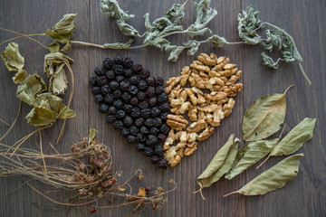 heart of dried cherries, nuts and dried leaves of tea
