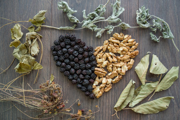 heart of dried cherries, nuts and dried leaves of tea