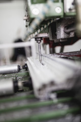 Factory for aluminum and PVC windows and doors production. Profile drilling.