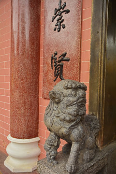 Guardian Lion or Foo Dog at the entrance to the historic Hainan Assembly Hall in the UNESCO listed central Vietnamese town of Hoi An