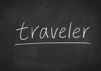 traveler concept word on a blackboard background