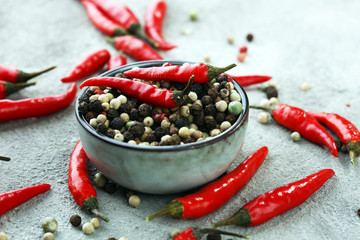 red hot bird chili pepper with pepper corns