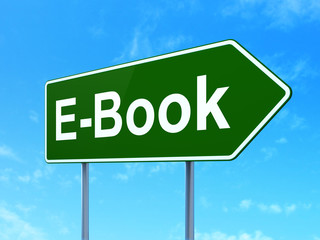 Studying concept: E-Book on green road highway sign, clear blue sky background, 3D rendering
