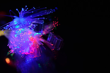 Ethernet connector optical fibre against black background