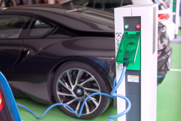 Fototapeta na wymiar Electric vehicle - EV charging station