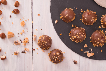 Chocolate truffles with caramel cream filling. 