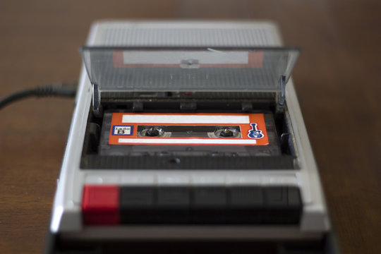 Vintage cassette tape player with audio cassette tape inside