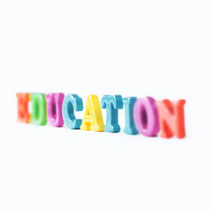 blurred image of the word formation on a light background .photo with copy space