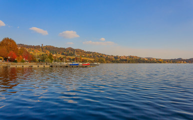 view of the lake of viverone in italy/ Lake Viverone is the third largest lake in Piedmont in Italy , It is a lake of glacial origin,and an important fish and tourist resource